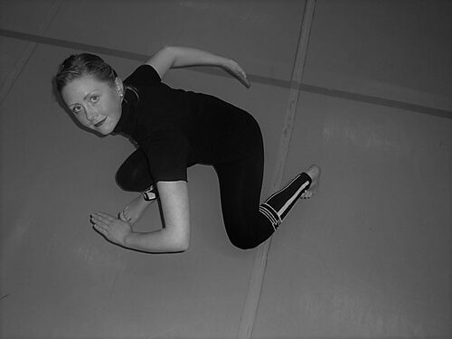 A participant in movement on the floor